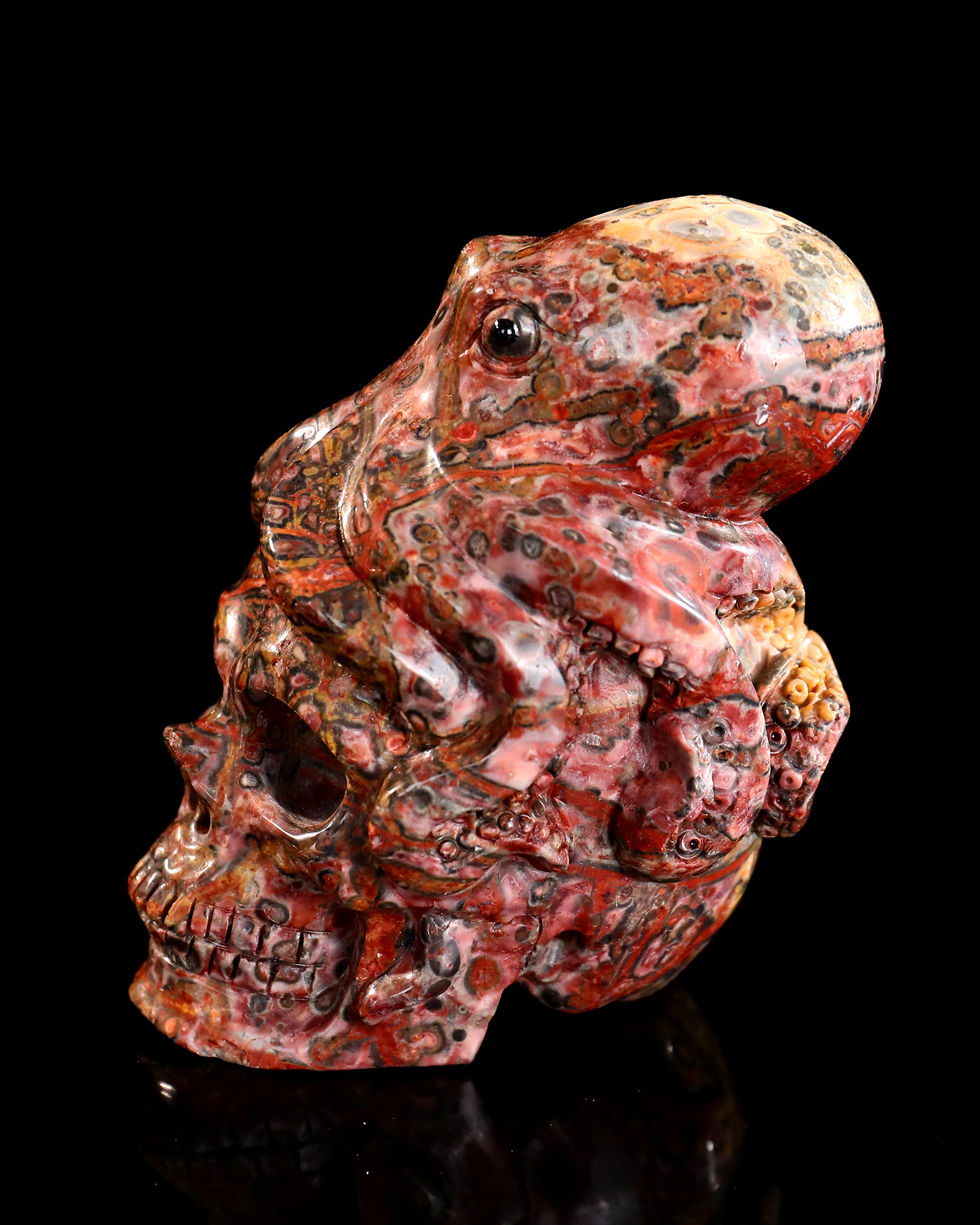 Red Leopard Skin Stone Skull Adorned with Hand-Carved Octopus Natural Gemstone Carving