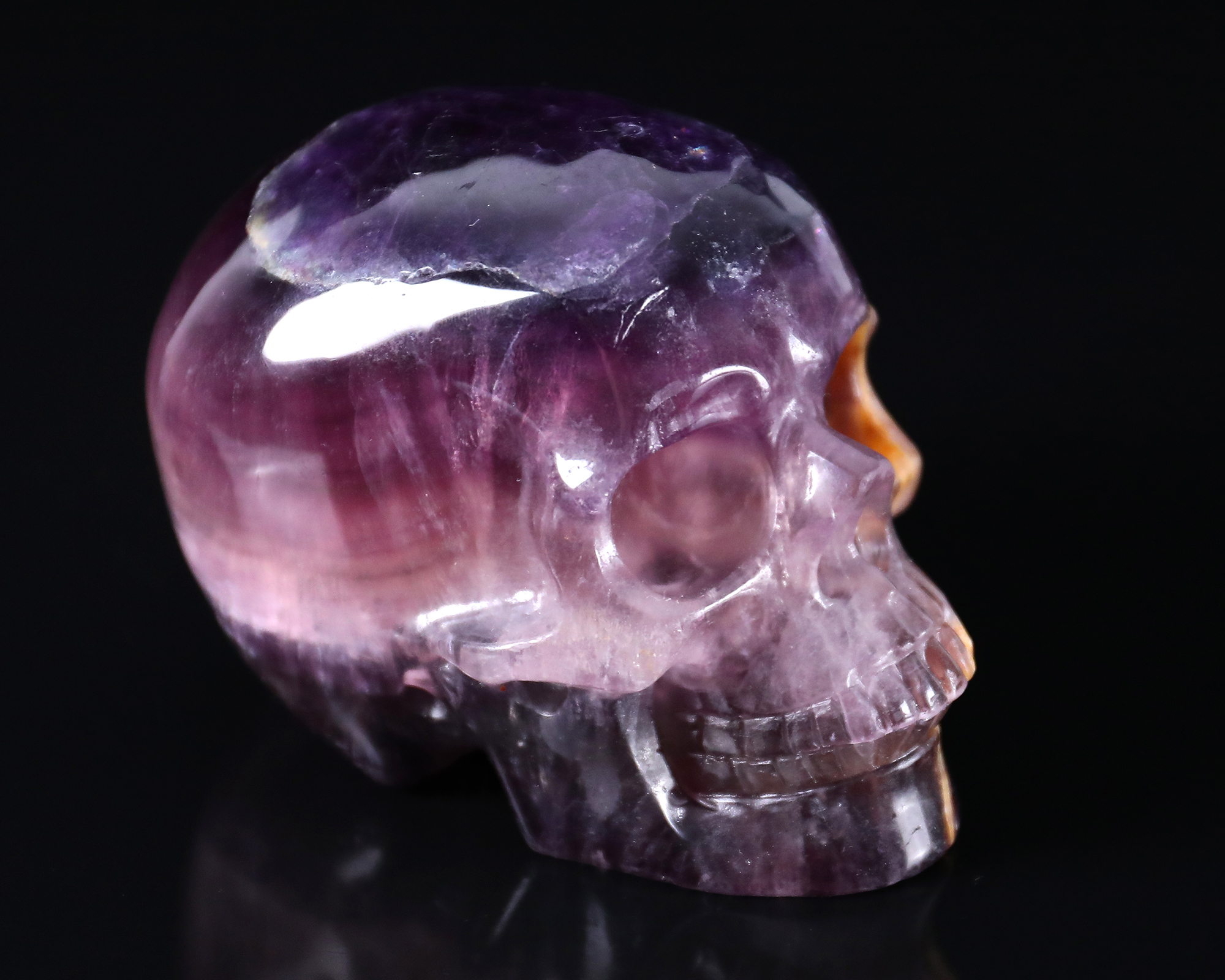 Hand-Carved Fluorite Skull: Vibrant Natural Colors & Translucent Crystal Craft