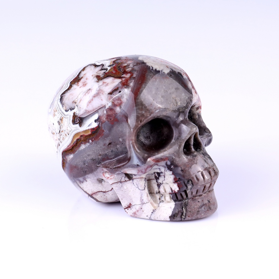 3.0" Red Crazy Lace Agate Hand Carved Crystal Realistic Skull Sculpture