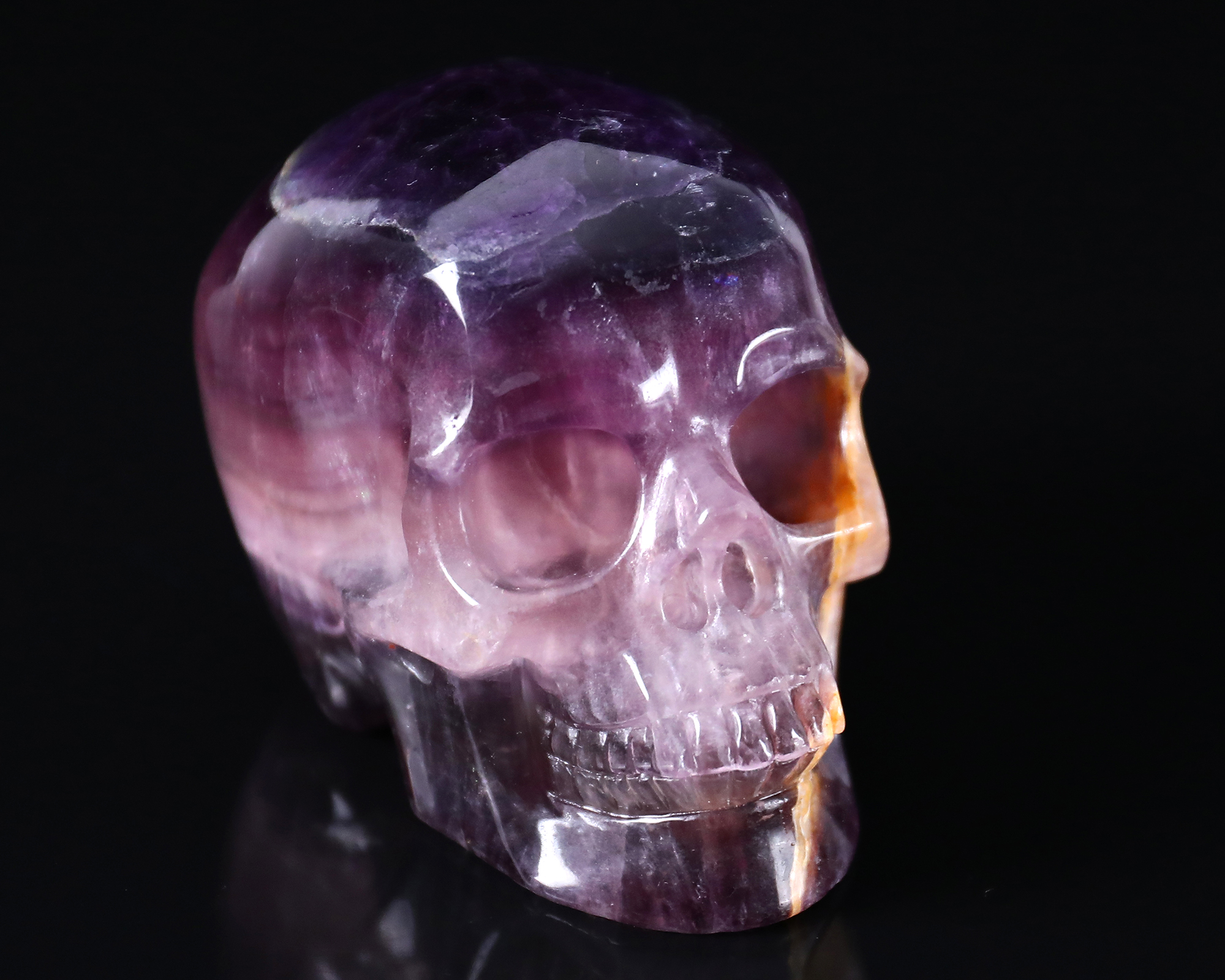 Hand-Carved Fluorite Skull: Vibrant Natural Colors & Translucent Crystal Craft